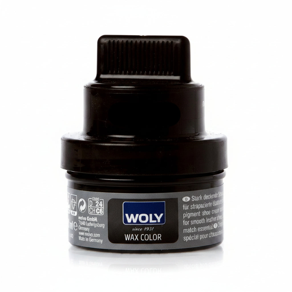 Cire de patin de marque WOLY de couleur noir